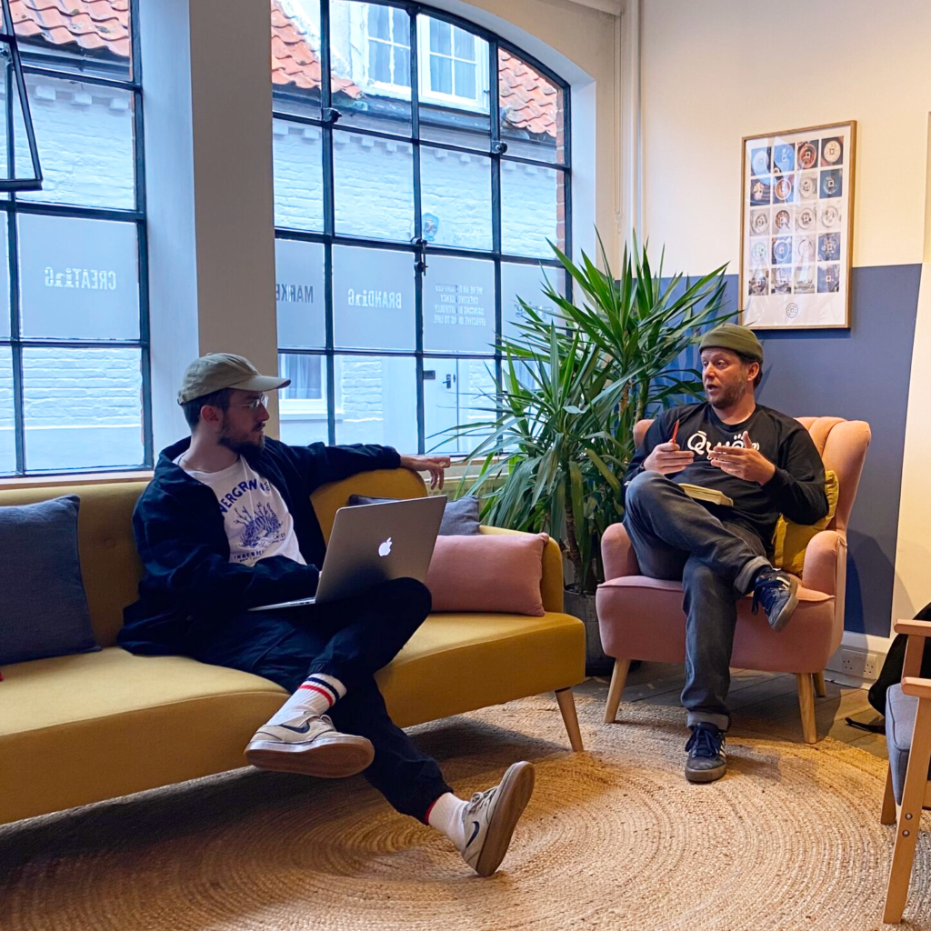 Glen and Charlie sat in the Spring office telling the SEO Heist story about AI.